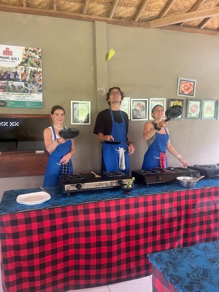 Guests flipping Dadar Gulung pandan crepes